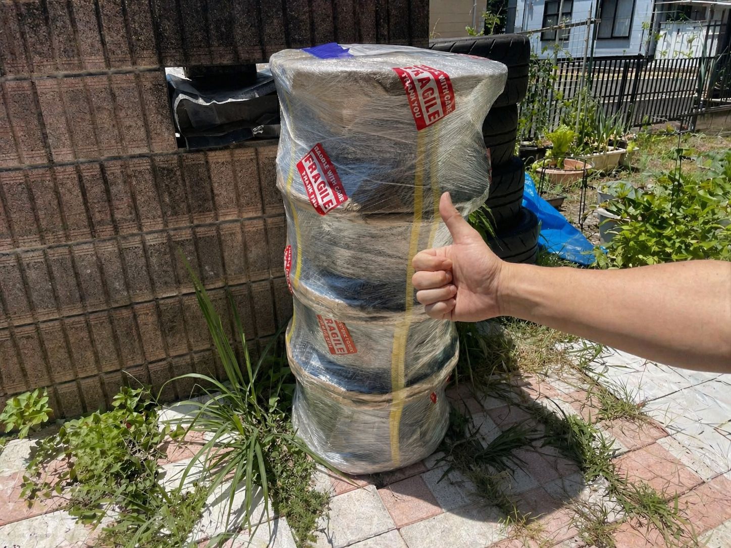 Wheels packaged with FRAGILE markings, ready for international shipping